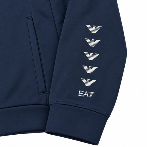Conjunto EA7 azul marino con águilas en las mangas — detalle: águilas de las mangas