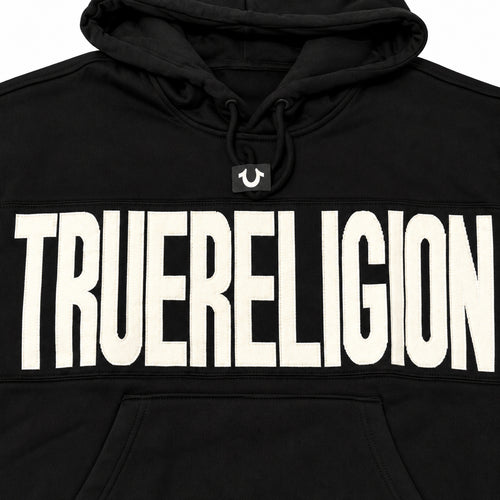 Conjunto True Religion negro con letras blancas — detalle: logo frontal