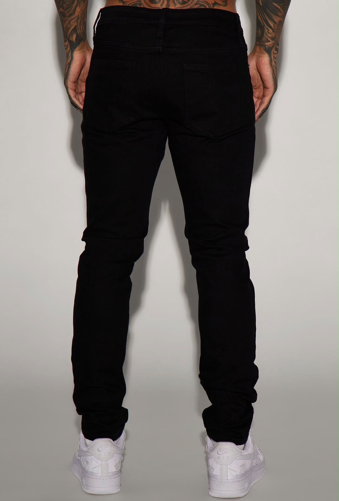 Jeans Fashion Nova negro liso para hombre, vista trasera
