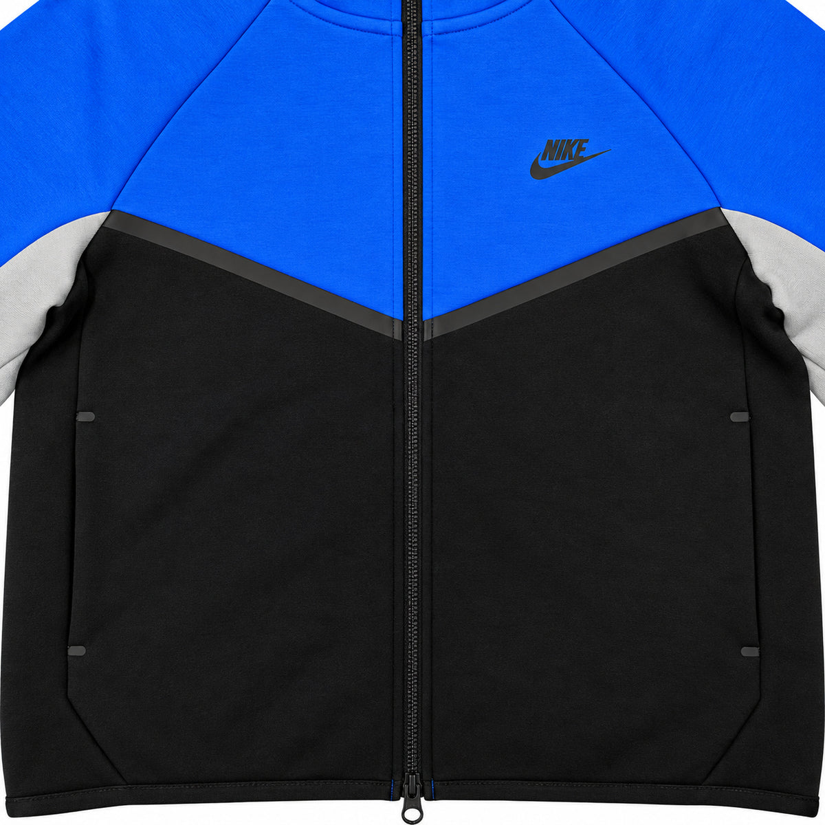 Polerón Nike Tech azul, negro y gris con cierre — detalle de paneles azul, negro y gris